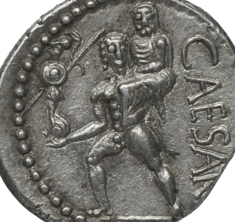 Revers d'une monnaie d'argent : un homme marche vers la droite, portant un vieillard sur son épaule gauche et tenant une petite statue dans sa main droite.