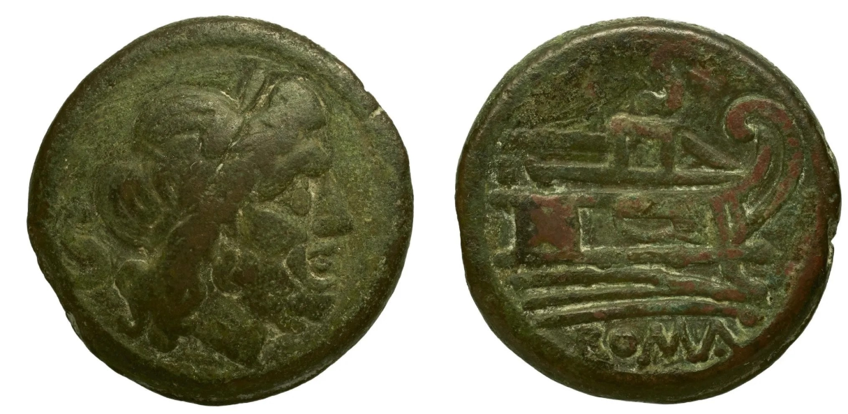 Monnaie de bronze portant une tête barbue à deux visages opposés.