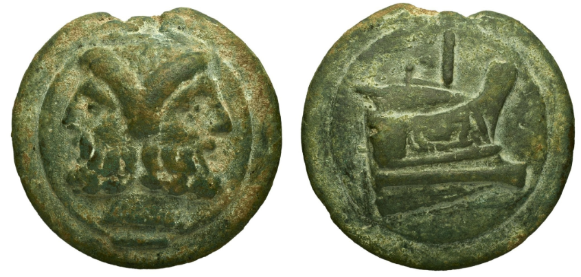 Grosse monnaie de bronze coulée : une tête barbue à deux visages opposés sur une face, une proue de navire sur l'autre.